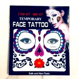 Día de los muertos face tattoo